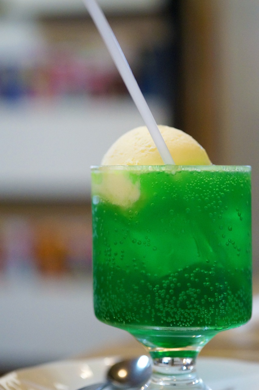 A green drink with a straw
AI-generated content may be incorrect.