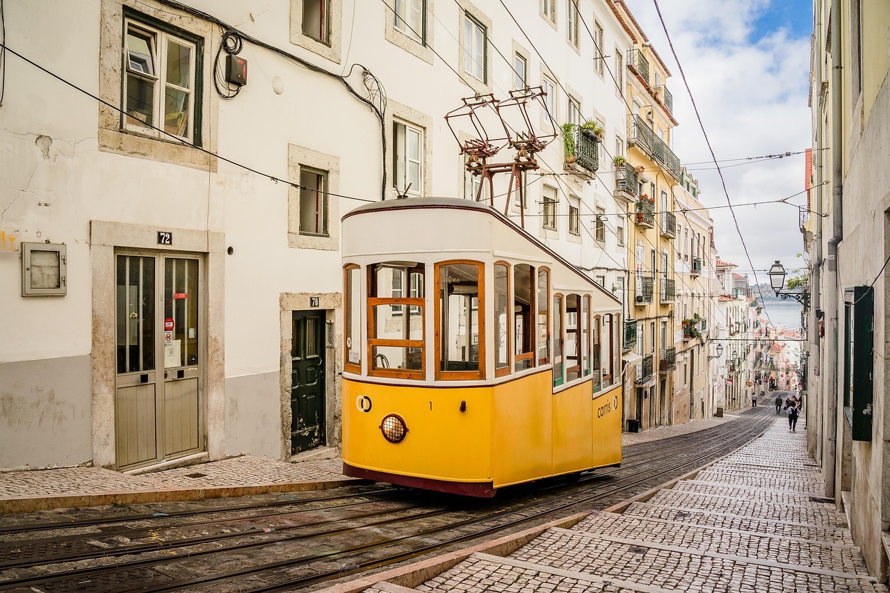 A yellow trolley on a street
AI-generated content may be incorrect.
