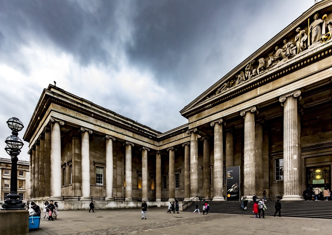 British Museum with columns and people walking around
AI-generated content may be incorrect.