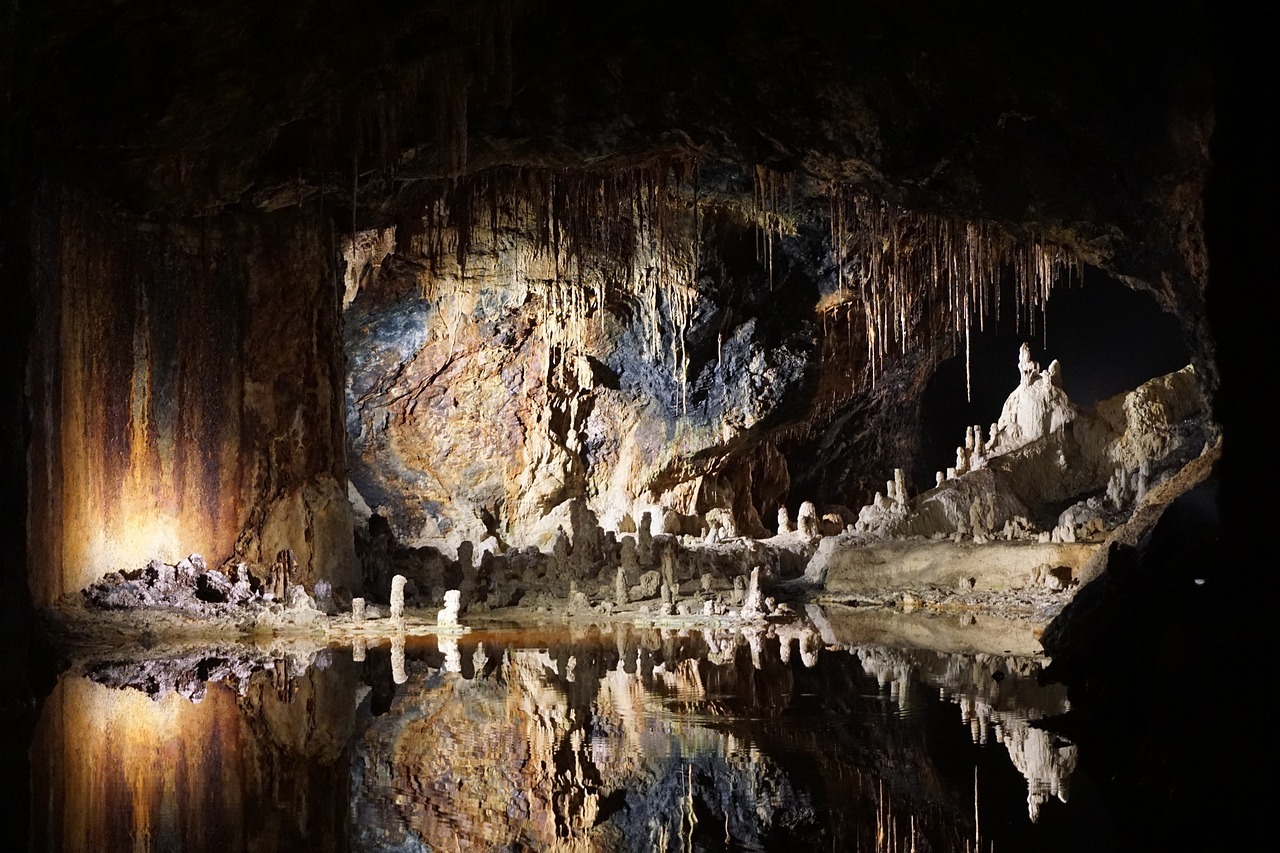 A cave with stalactites and stalagmites

AI-generated content may be incorrect.
