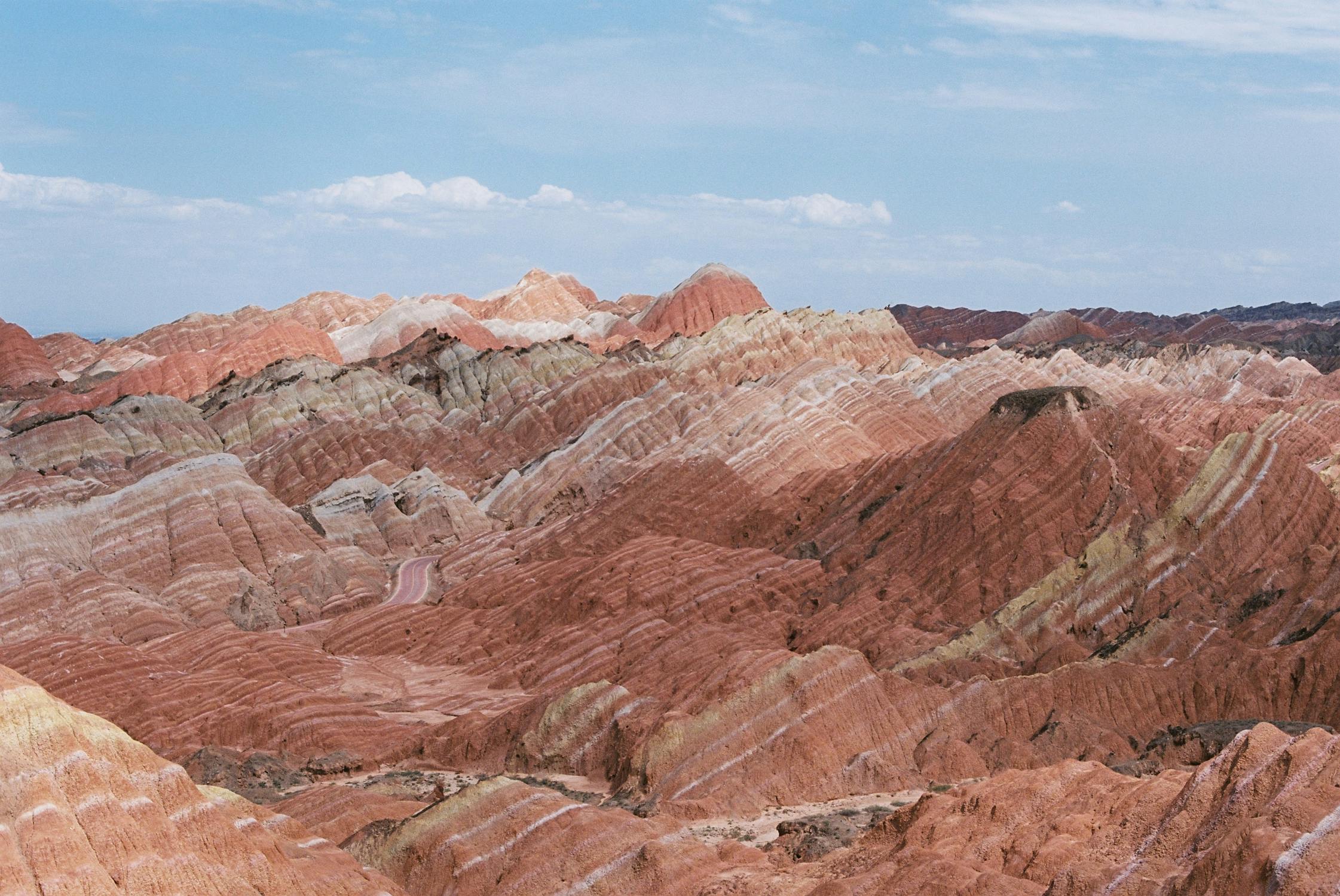 A landscape of a mountain range

AI-generated content may be incorrect.